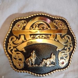 Montana Silversmith 24kt Gold W/Gunmetal Trophy Buckle W/Team Roping Gold Figure